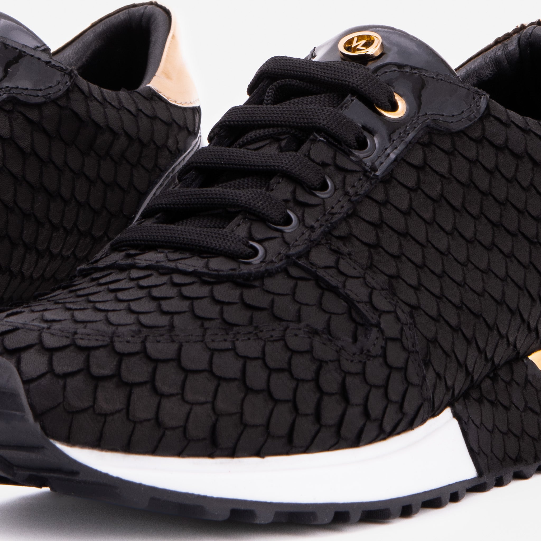 The Scarlet Black Leather Sneaker Fine Craftsmanship