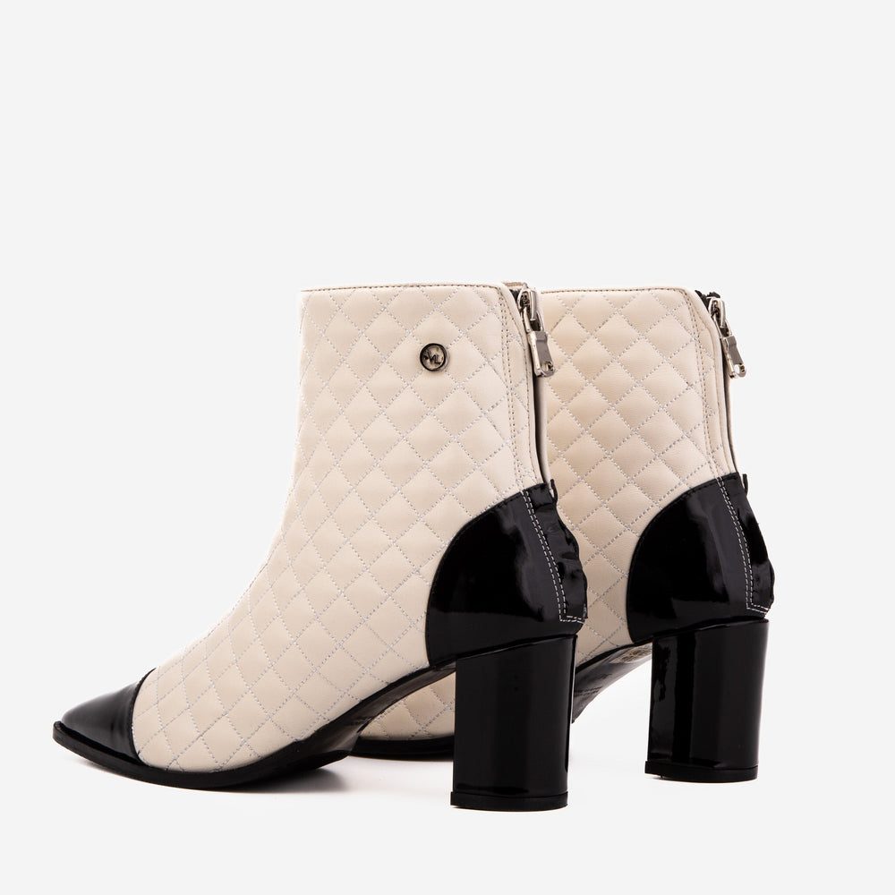 The Celeste Cream Black Quilted Leather Women’s Boot For Sale