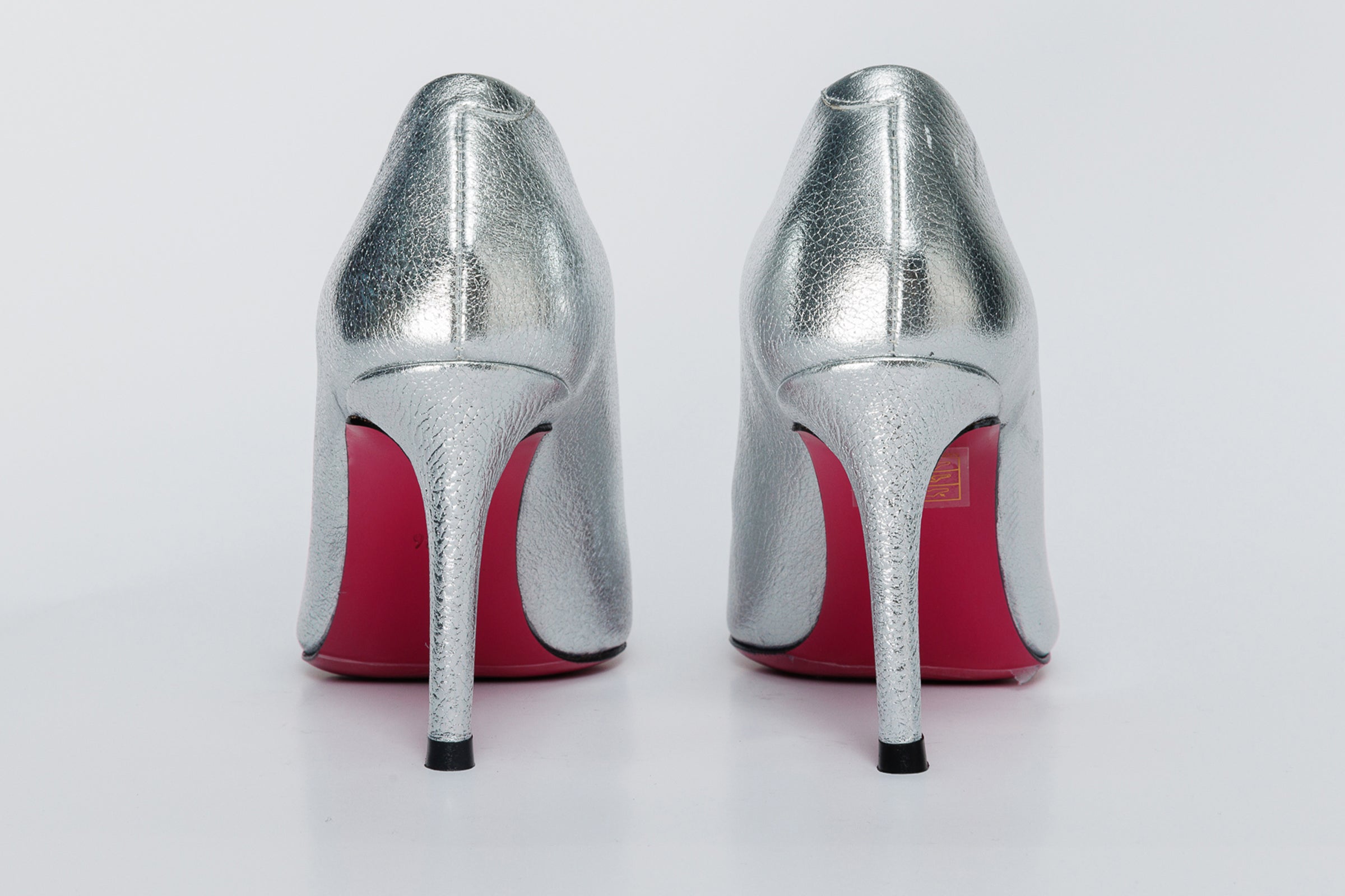 The Ege Silver Leather Pump Fuchsia Sole Shoe For Sale