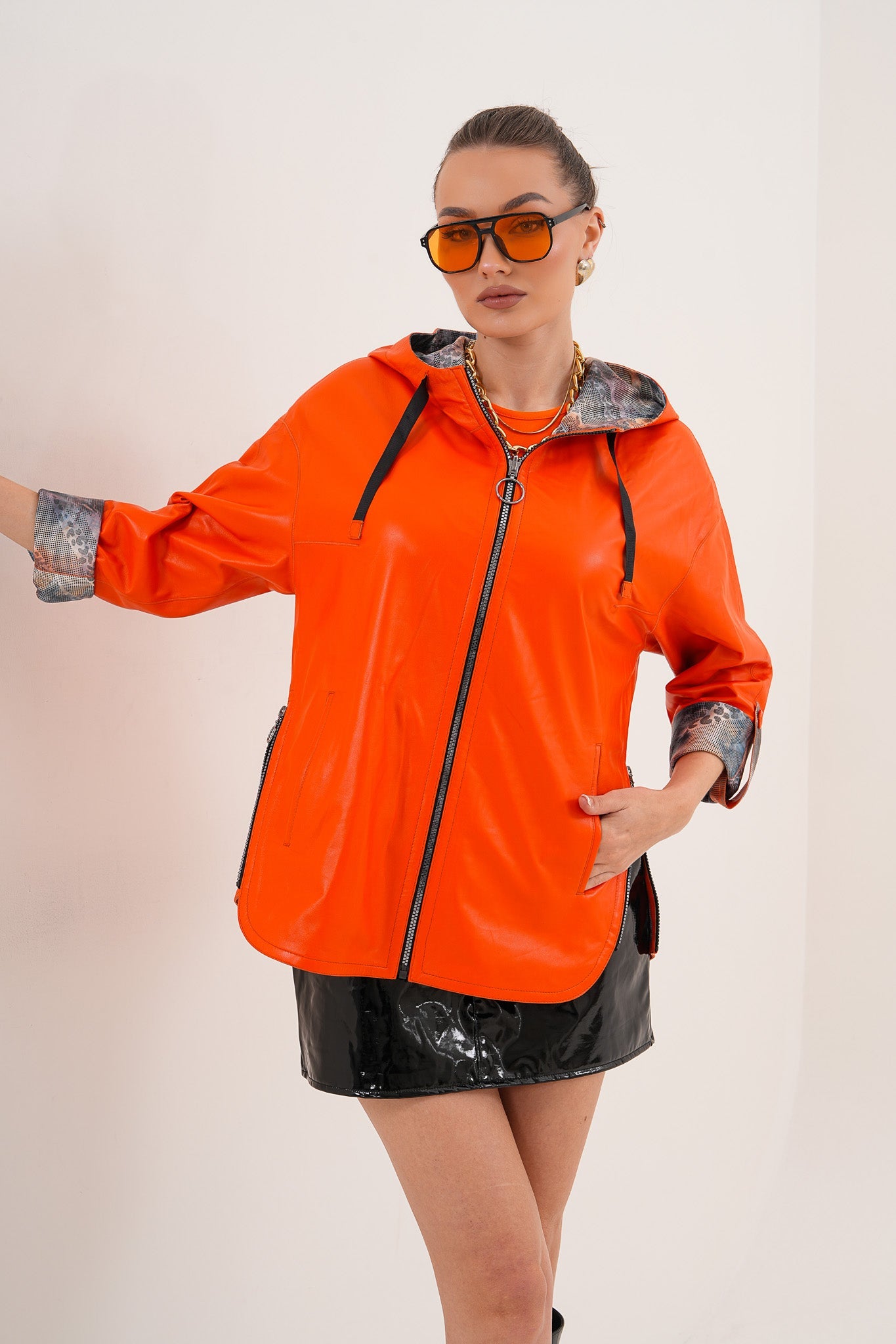 The Nyxara Reversible Hooded Orange Leather Jacket Fine Craftsmanship