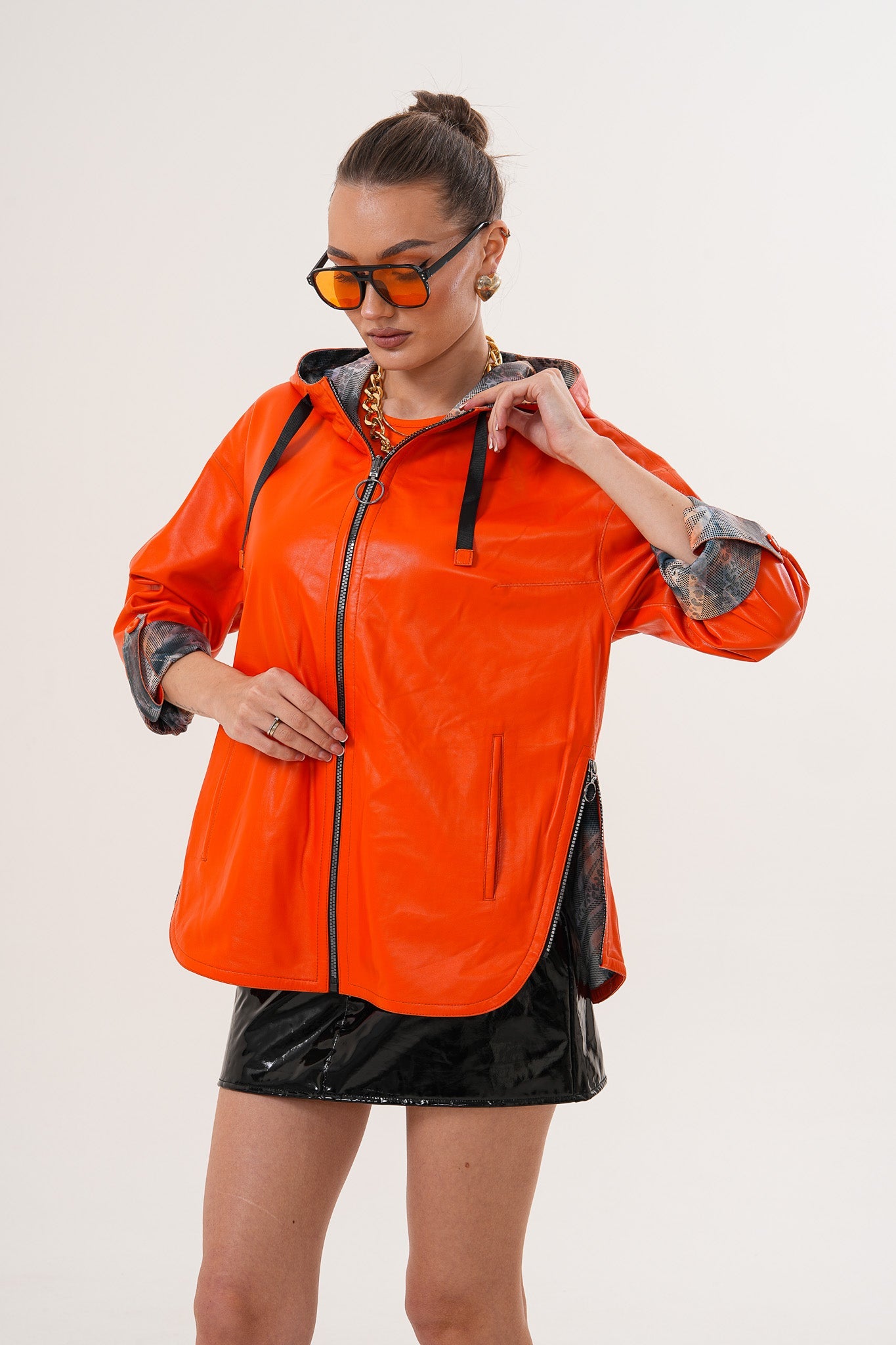 The Nyxara Reversible Hooded Orange Leather Jacket Fine Craftsmanship