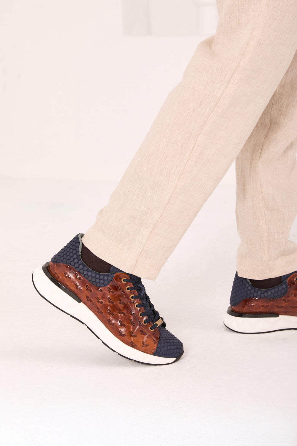 The Caesars Navy Tan Leather Sneaker All New