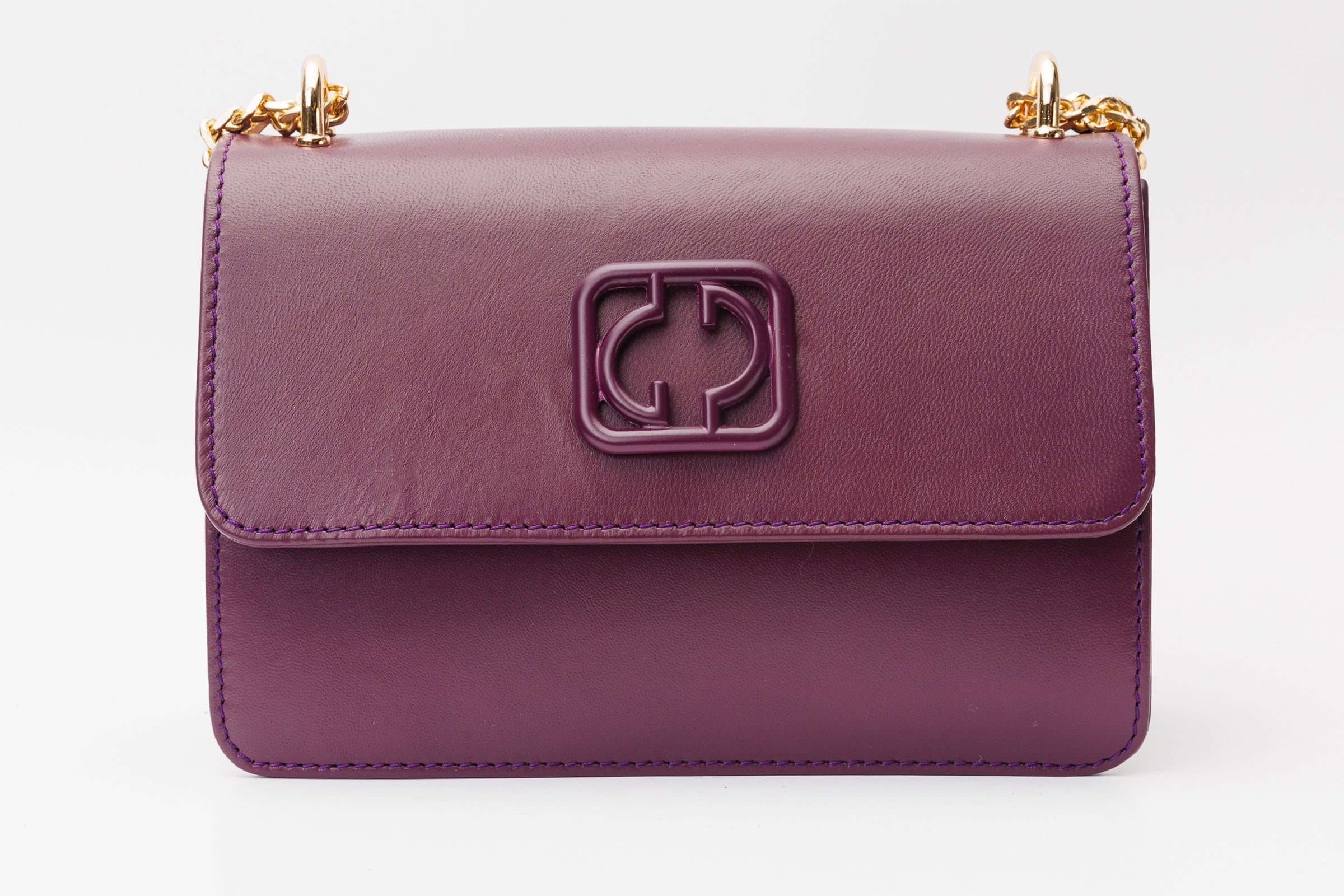 The Maneadero Purple Leather Handbag On Sale