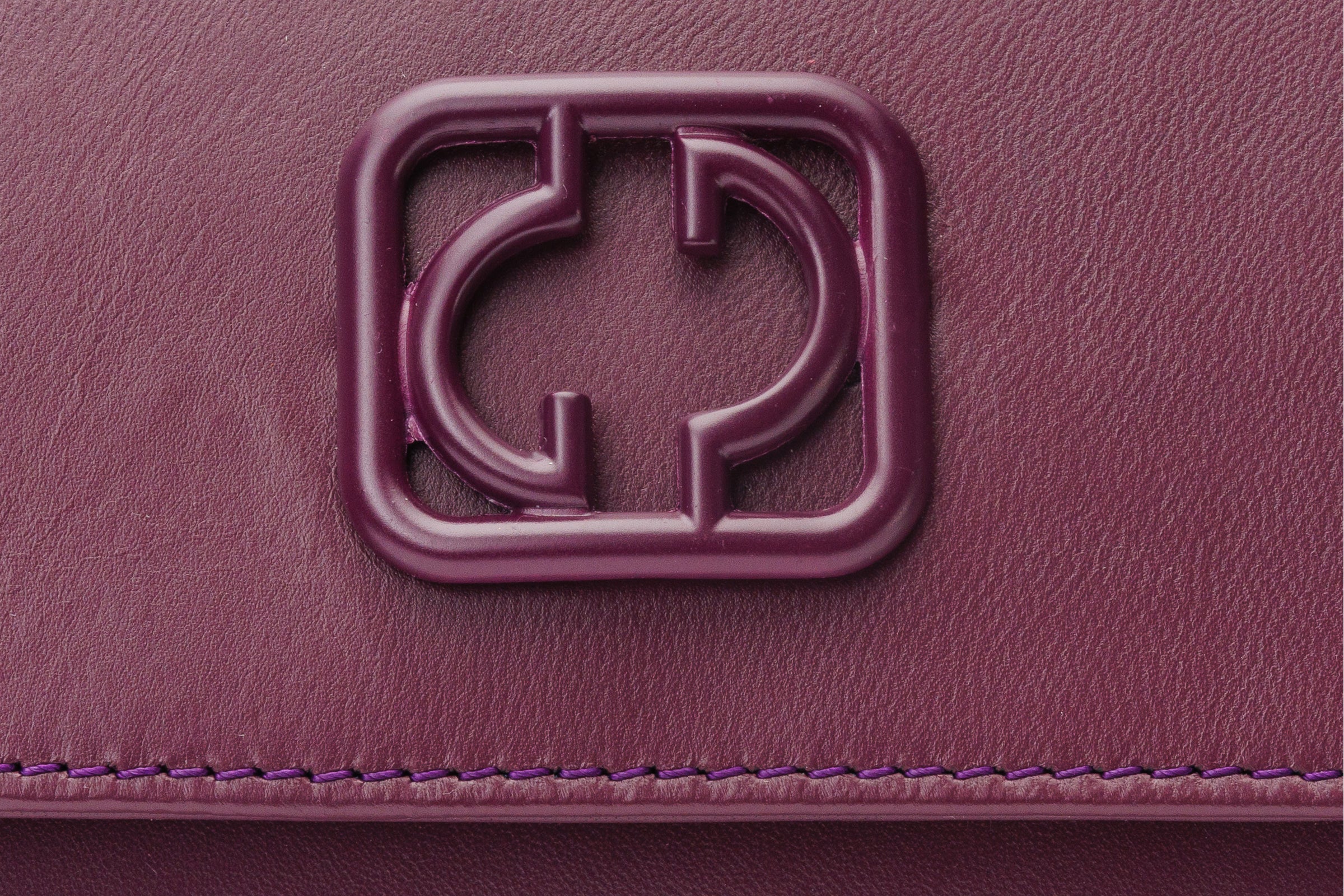 The Maneadero Purple Leather Handbag On Sale