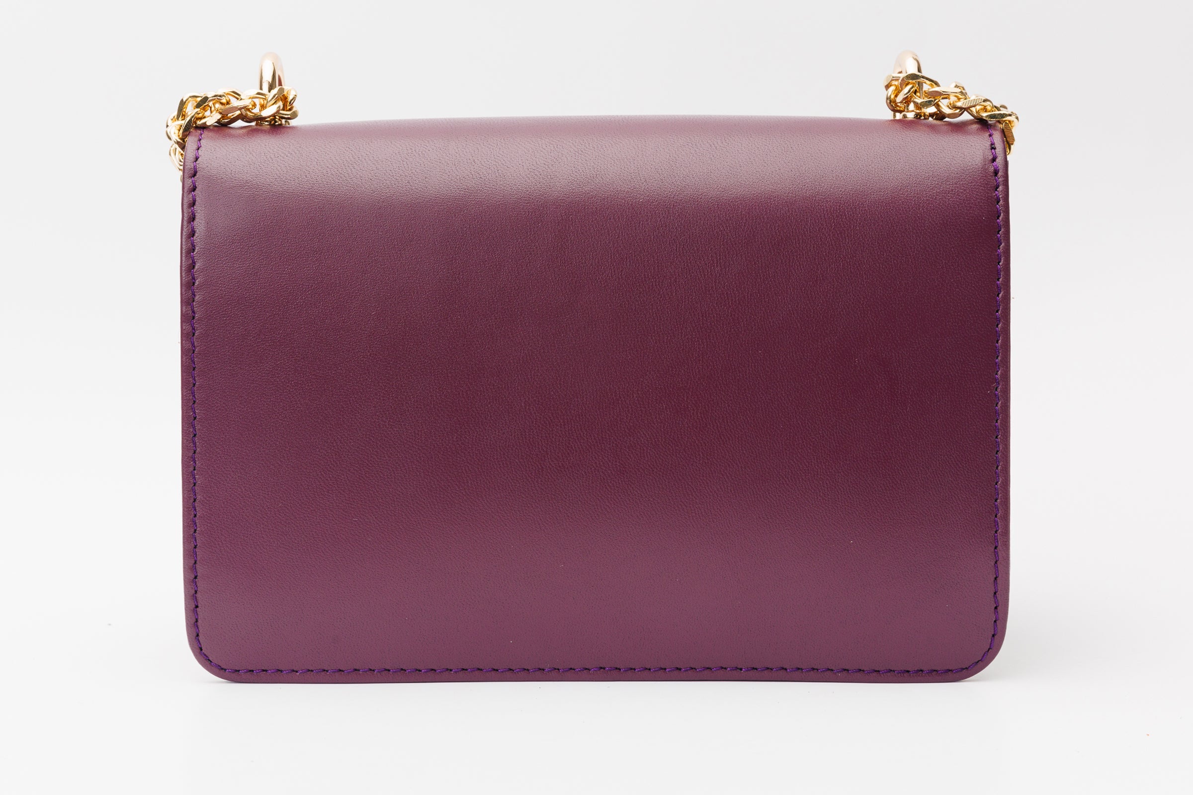 The Maneadero Purple Leather Handbag On Sale