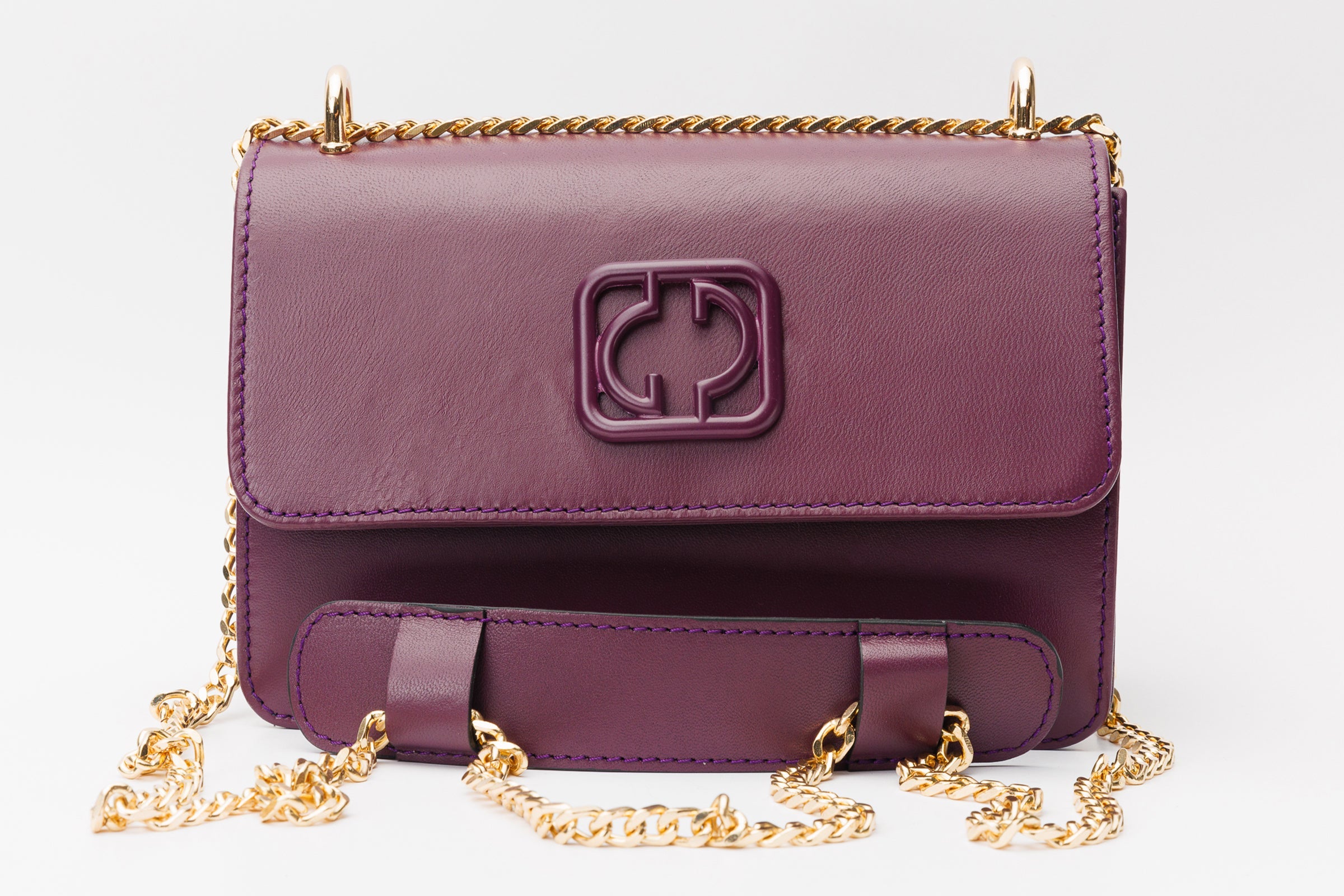 The Maneadero Purple Leather Handbag On Sale