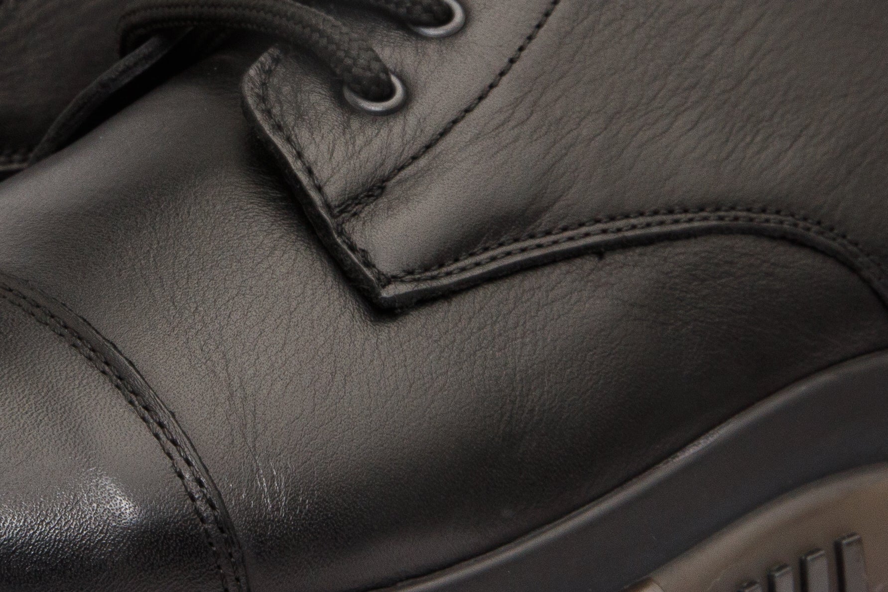 The Ottova Black Leather Lace-Up Sneaker Boot with a Zipper Fine Craftsmanship