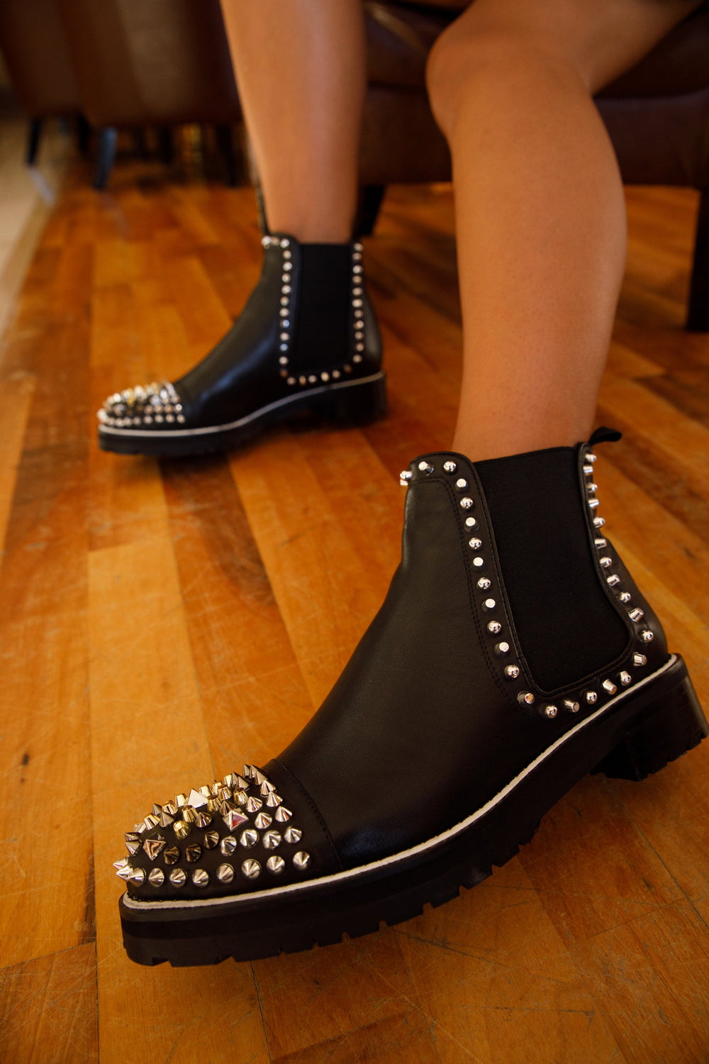 The Vuvulane Black Spike Leather Ankle Boot On Sale